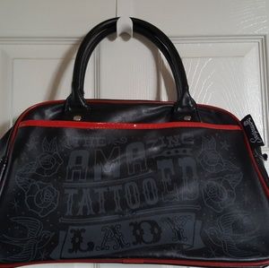 Sourpuss purse